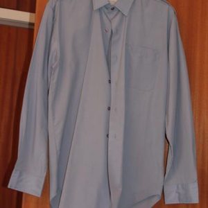 Blue shirt with shoulder tabs