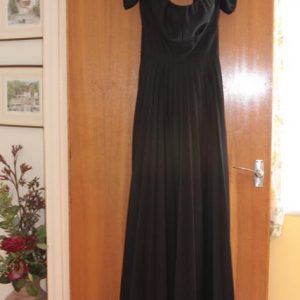 Long black pleated dress, off the shoulder