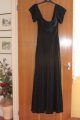 Long black pleated dress, off the shoulder