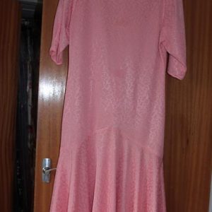 Peach 3/4 length sleeved dress, flared at bottom
