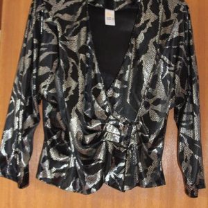 Black/silver wrap around glittery top, padded shoulders