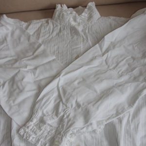 White long sleeved cotton blouse