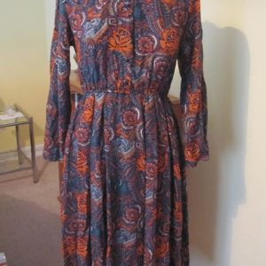 Floral long sleeved dress with buttons to waist