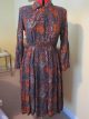 Floral long sleeved dress with buttons to waist