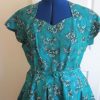 Emerald green dress with buckle belt, short sleeved
