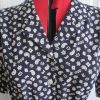 Navy patterned dress, short sleeved, buckle belt, pleated skirt