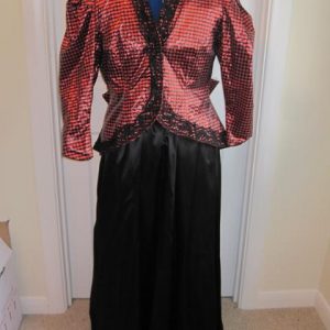 Black long skirt and red check jacket