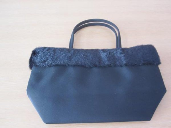 Black handbag with fur