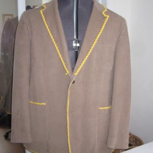 Beige jacket with yellow braiding